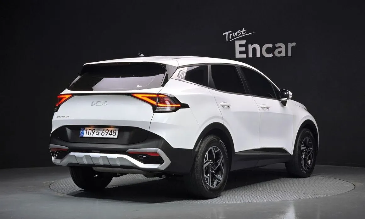 Kia Sportage — фото 6