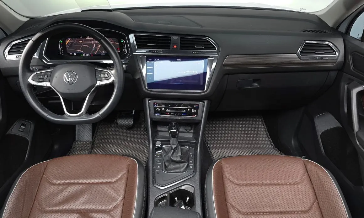 Volkswagen Tiguan — фото 10