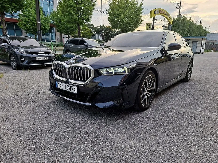 BMW 5-Series — фото 1