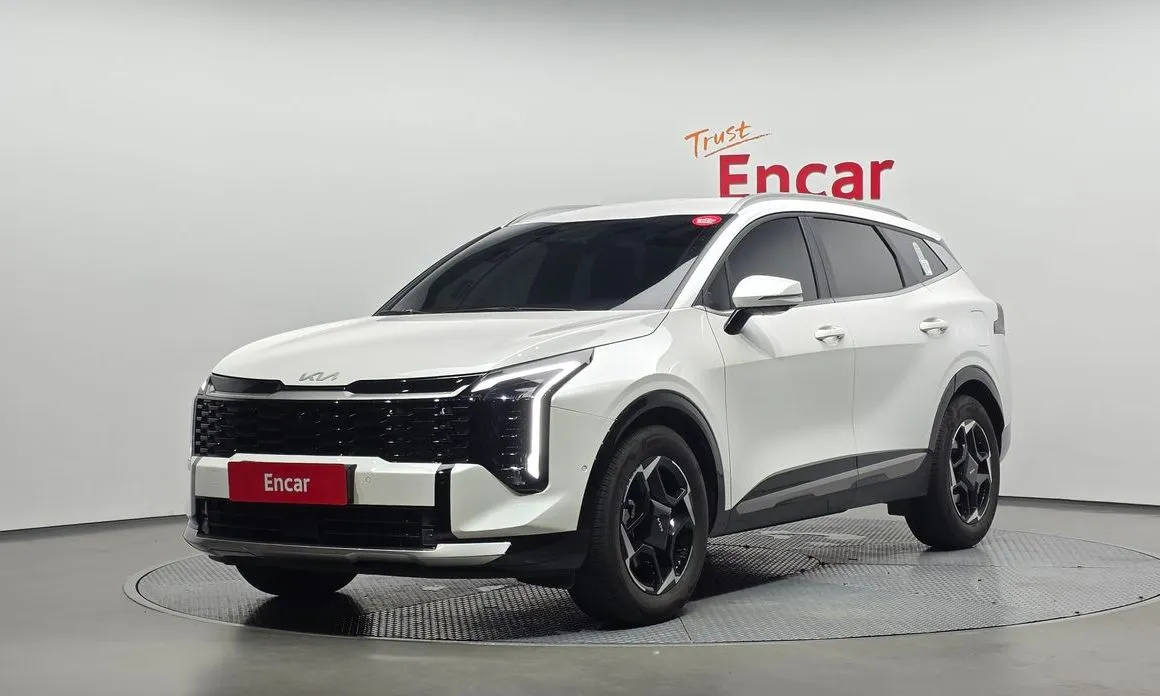 Kia Sportage — фото 1