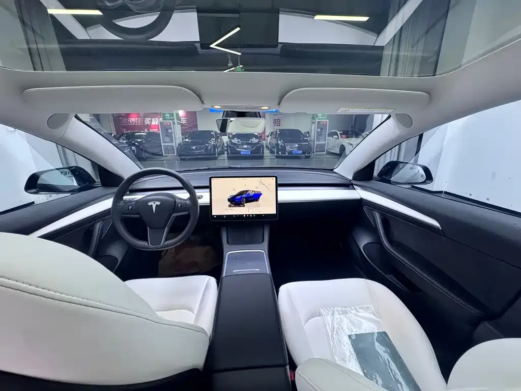 Tesla Model 3 — фото 7