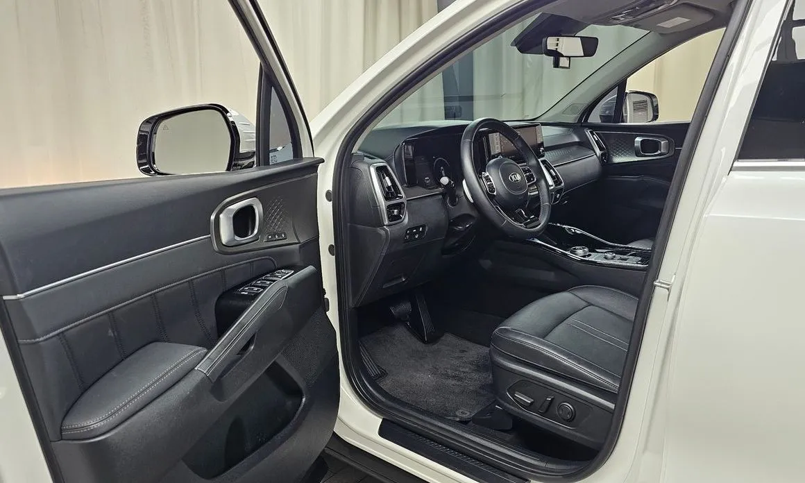 Kia Sorento — фото 7