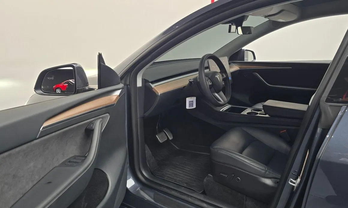 Tesla Model Y — фото 9