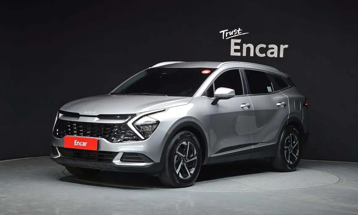 Kia Sportage — фото 1