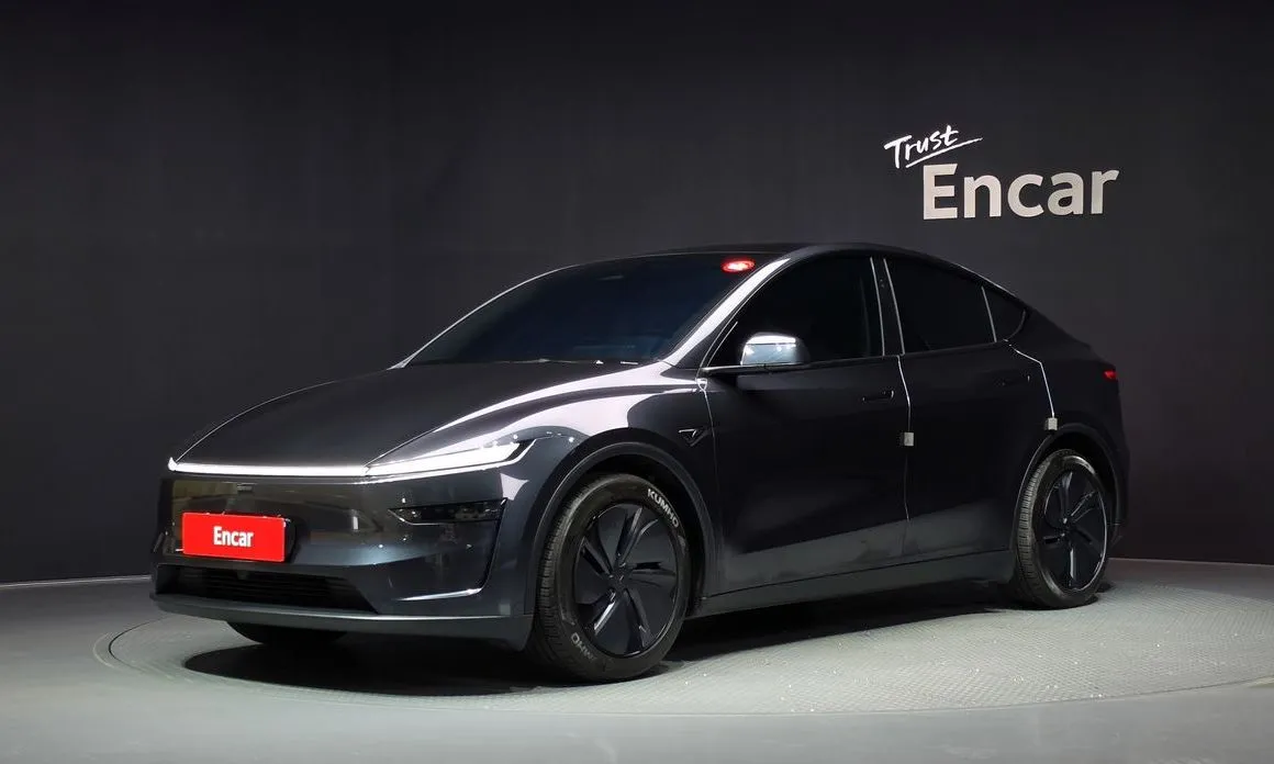 Tesla Model Y — фото 1