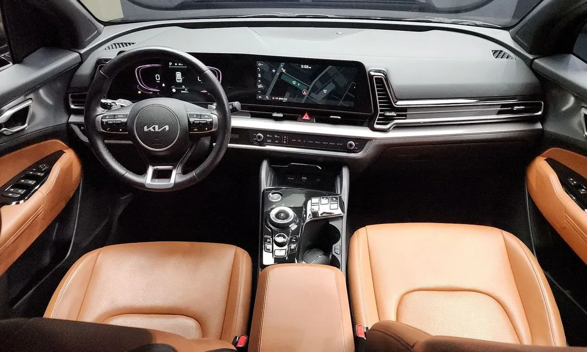 Kia Sportage — фото 10