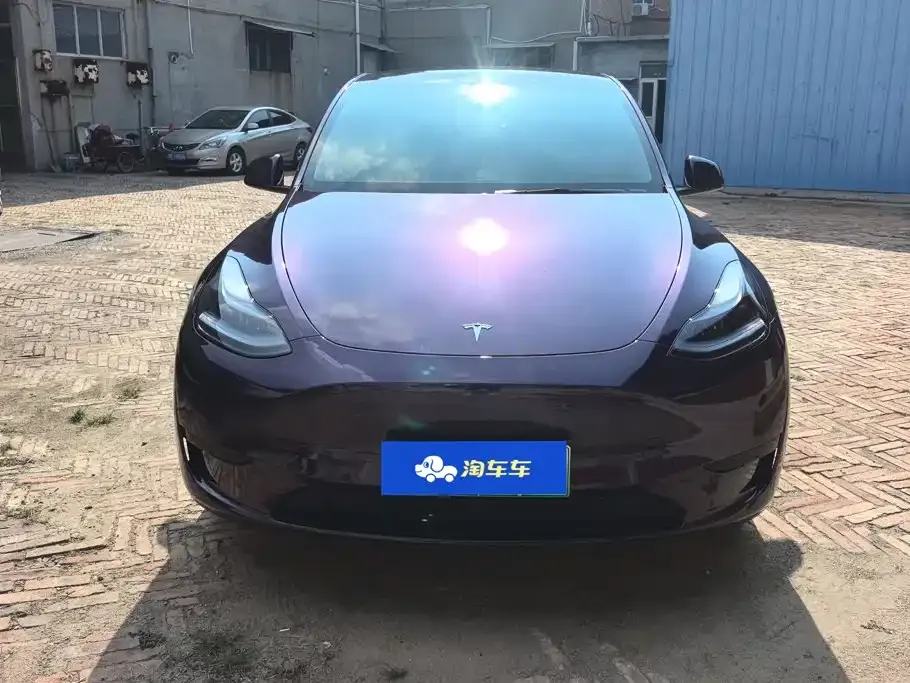 Tesla Model Y — фото 10