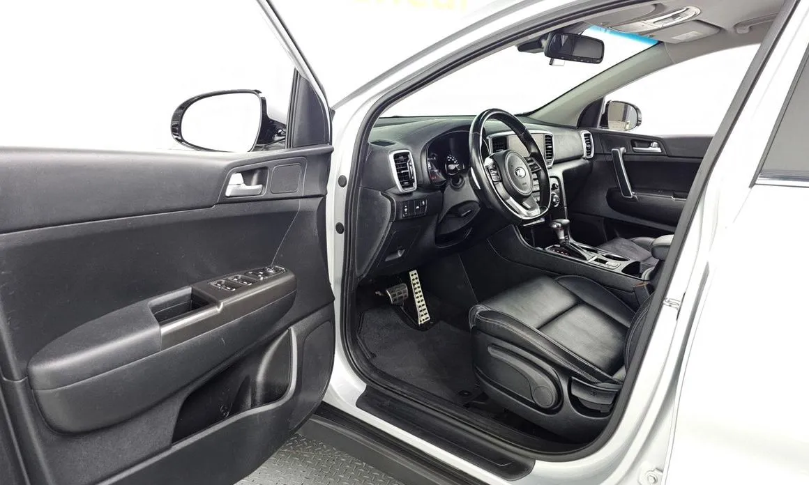Kia Sportage — фото 10