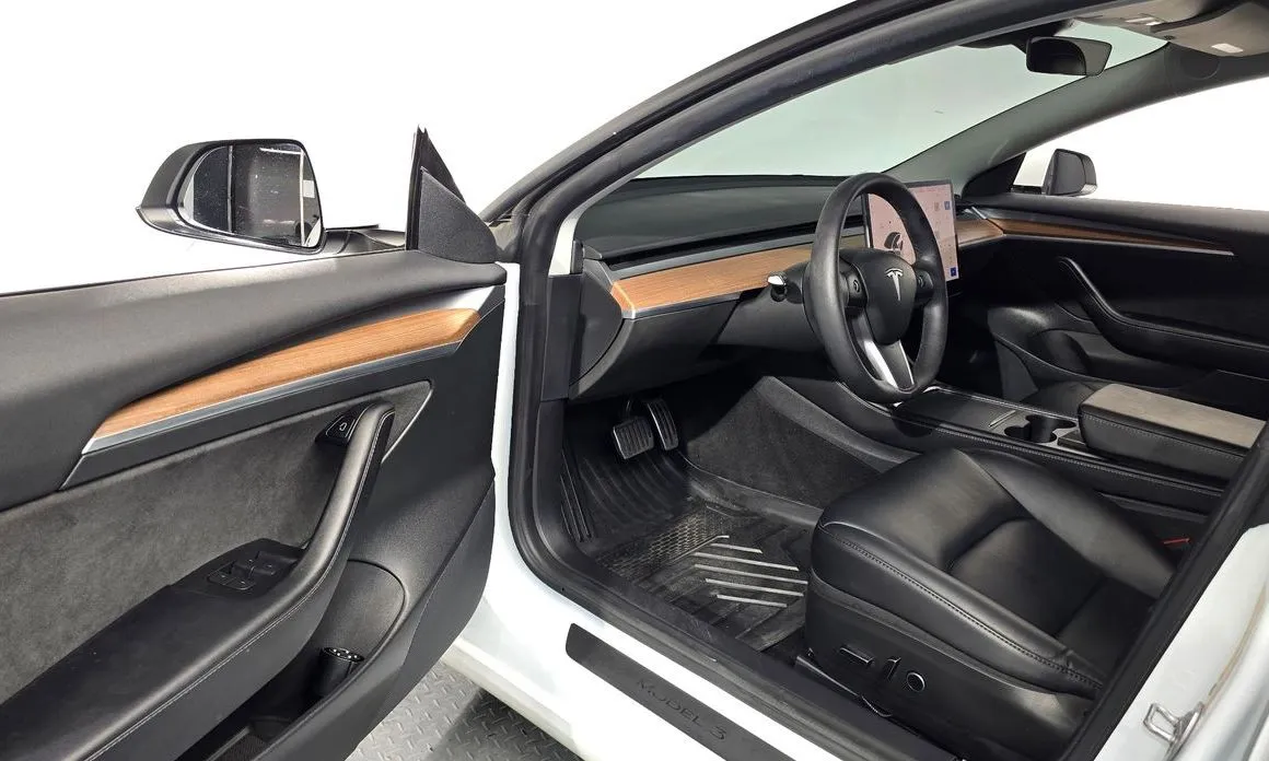 Tesla Model 3 — фото 10