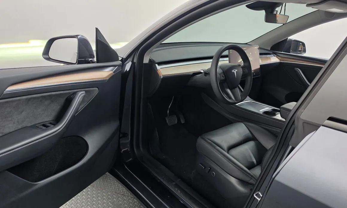 Tesla Model Y — фото 7