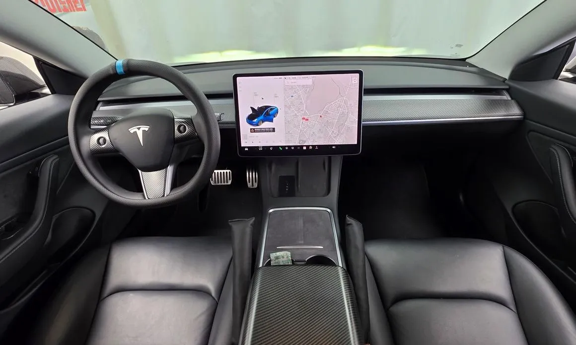 Tesla Model 3 — фото 10