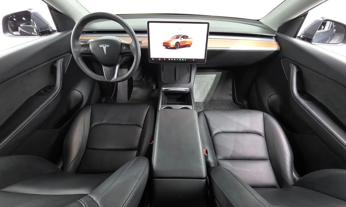 Tesla Model Y — фото 7