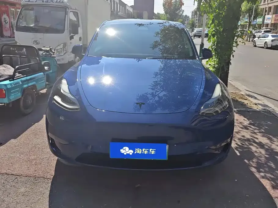 Tesla Model Y — фото 10