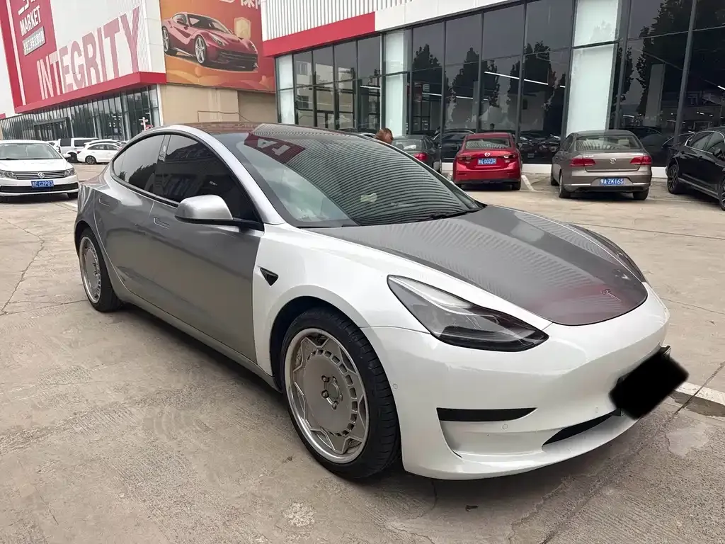 Tesla Model 3 — фото 7