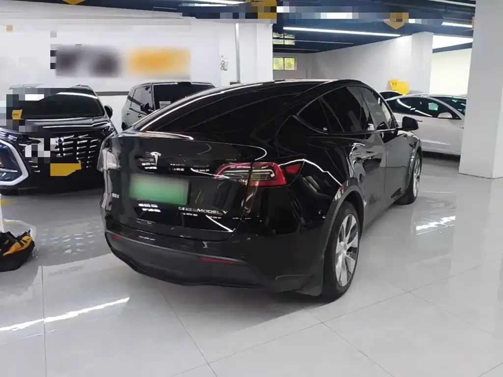 Tesla Model Y — фото 7