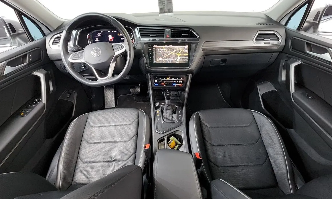 Volkswagen Tiguan — фото 10