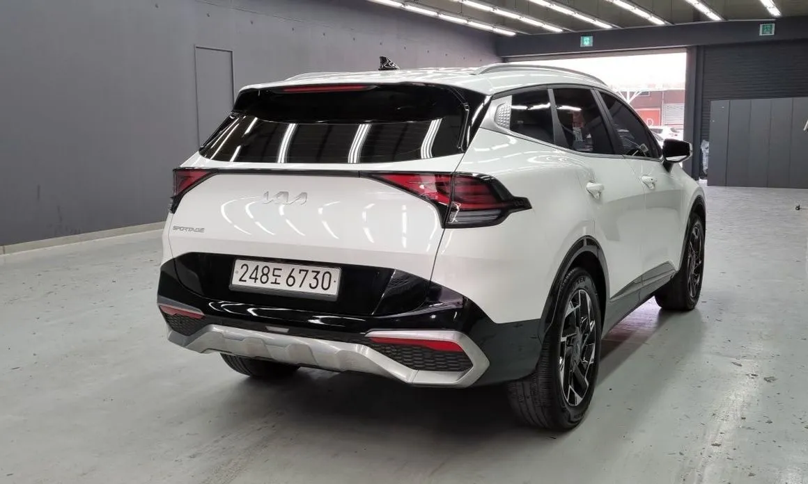 Kia Sportage — фото 7