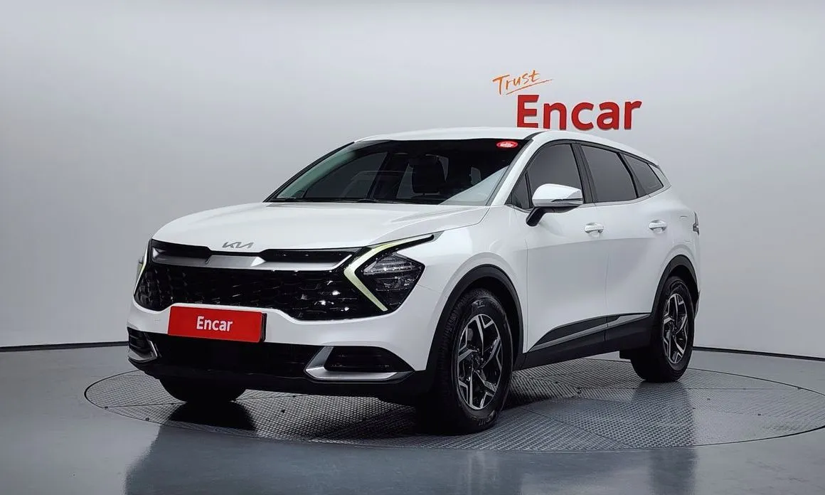 Kia Sportage — фото 1