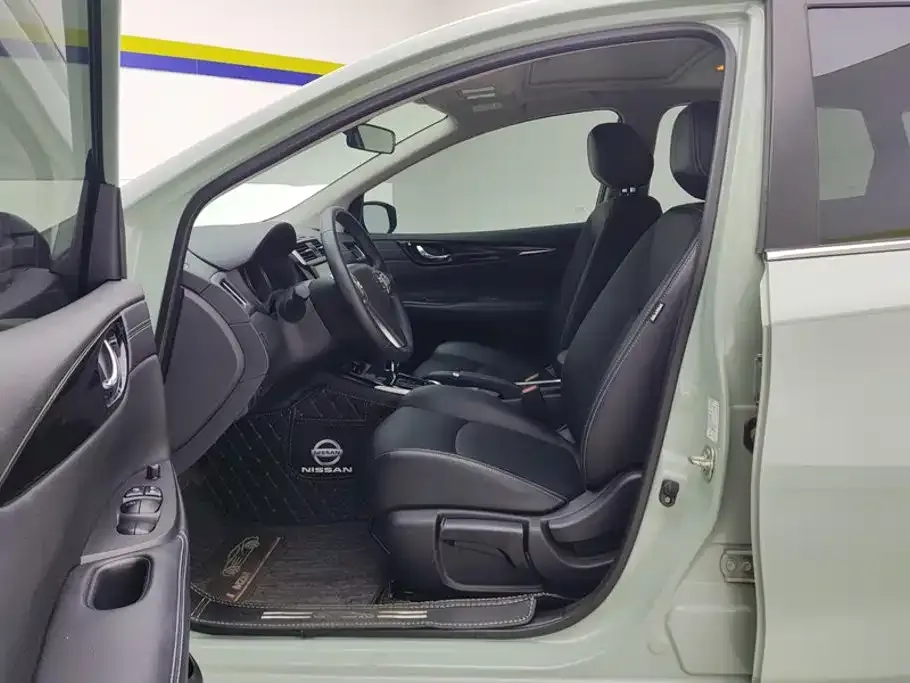 Nissan Tiida — фото 6