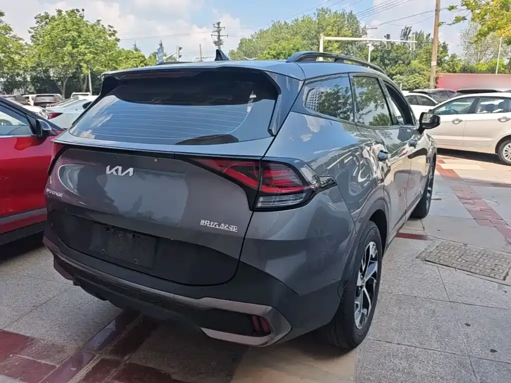 Kia Sportage — фото 7