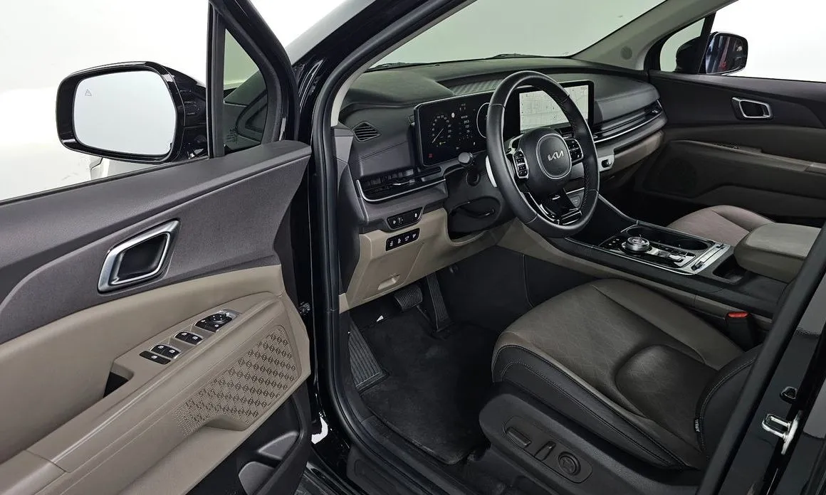 Kia Carnival — фото 10