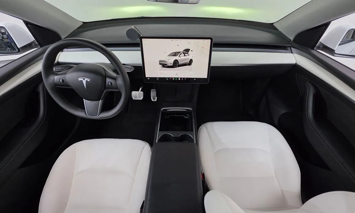Tesla Model Y — фото 6