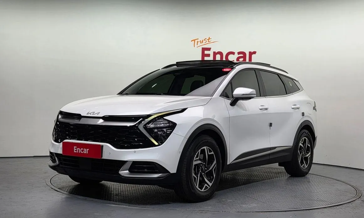 Kia Sportage — фото 1