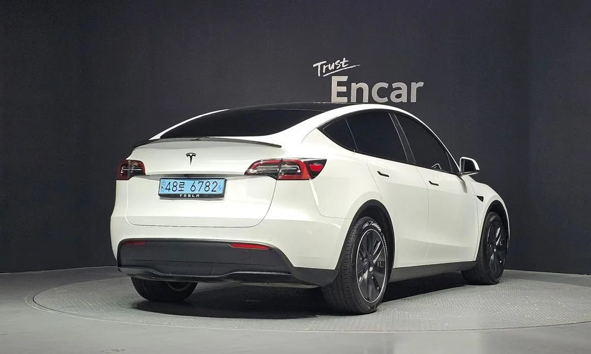 Tesla Model Y — фото 7