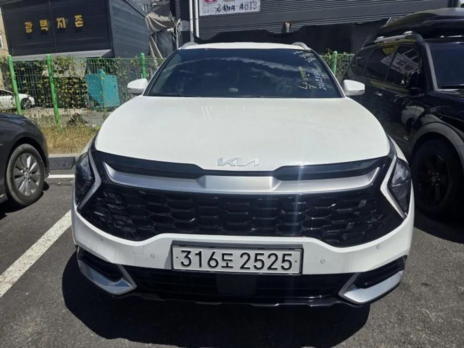 Kia Sportage — фото 1