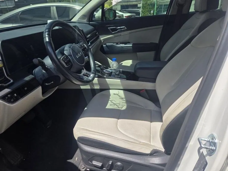 Kia Sportage — фото 9
