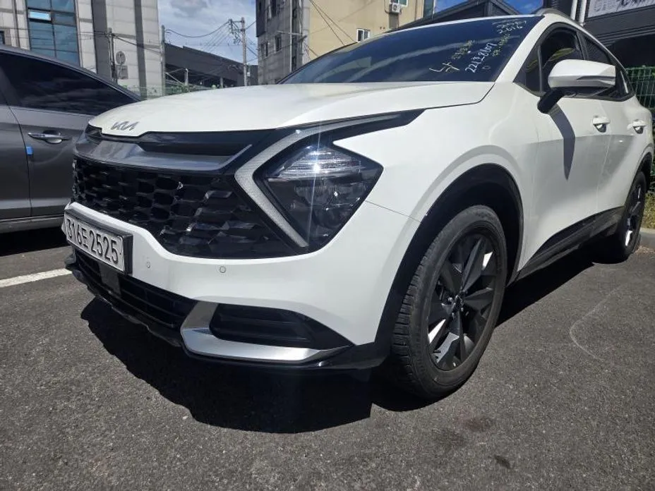 Kia Sportage — фото 10