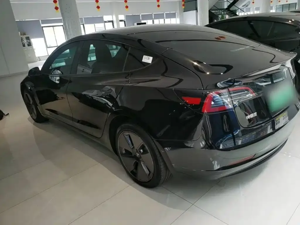 Tesla Model 3 — фото 8