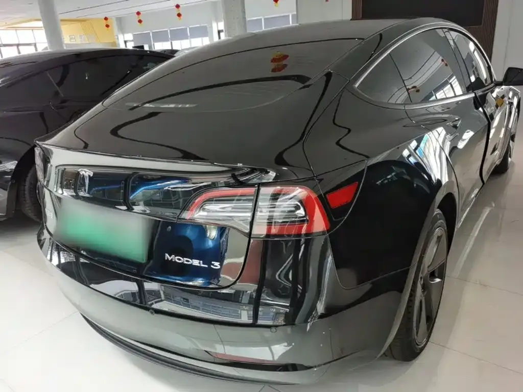 Tesla Model 3 — фото 5