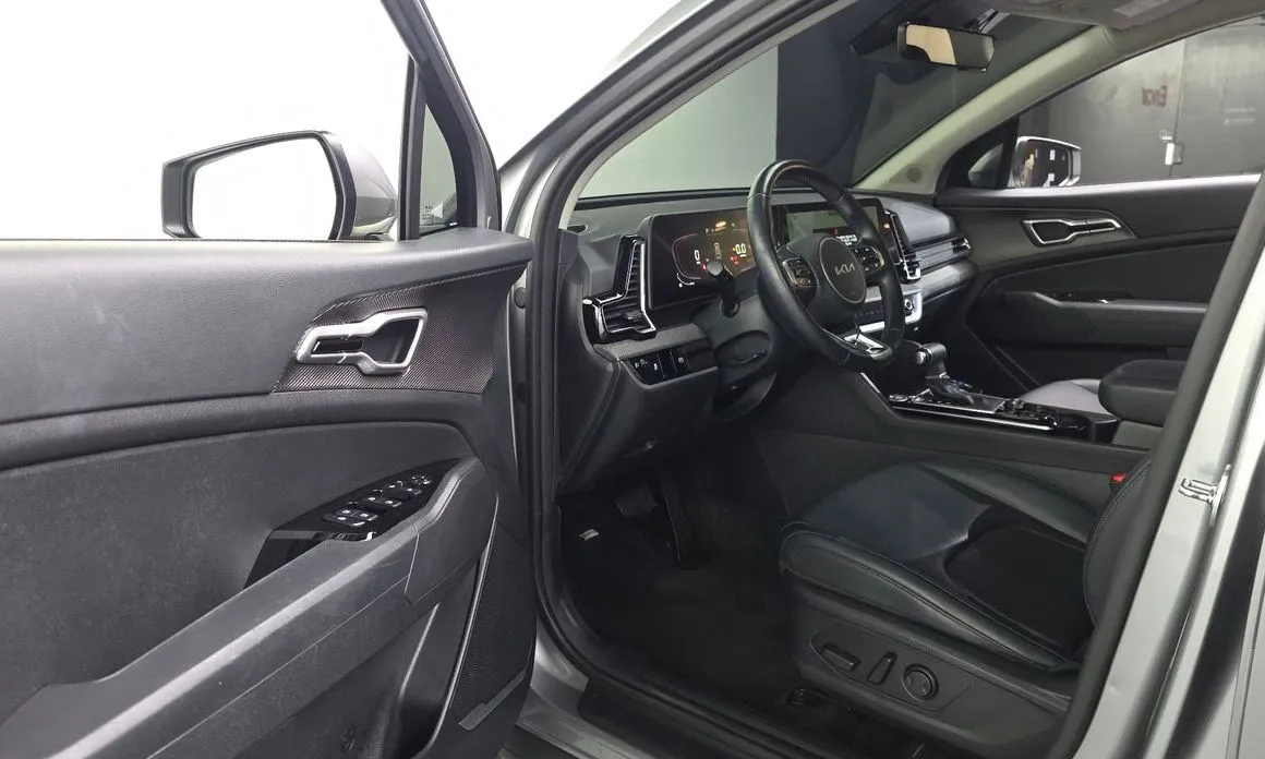 Kia Sportage — фото 9