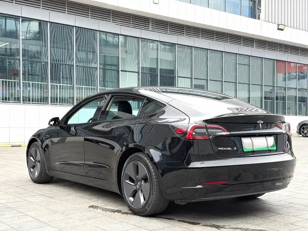 Tesla Model 3 — фото 7