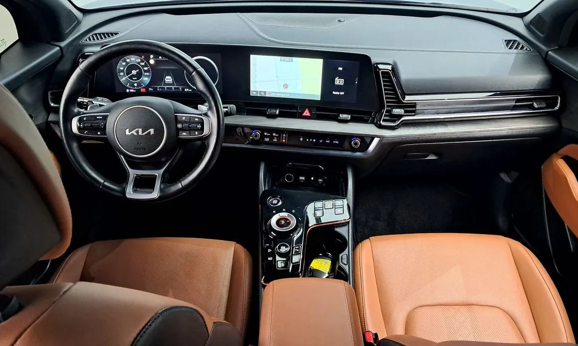 Kia Sportage — фото 9