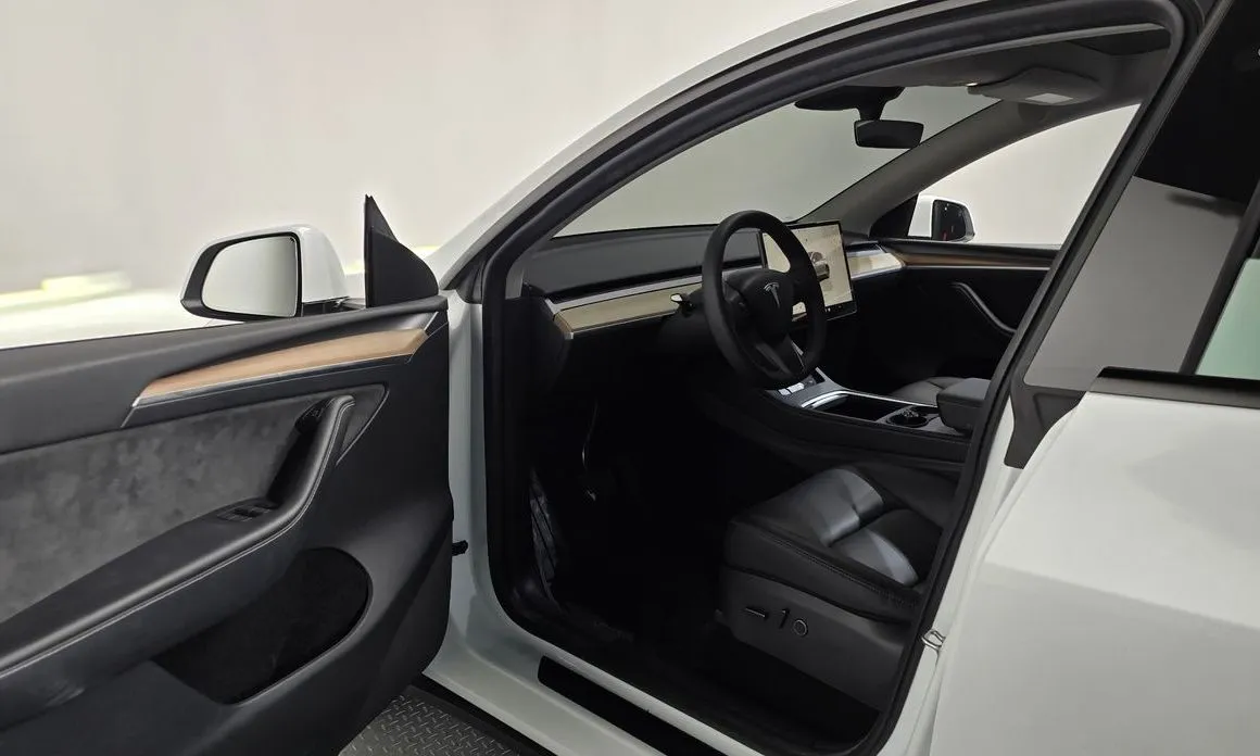 Tesla Model Y — фото 6