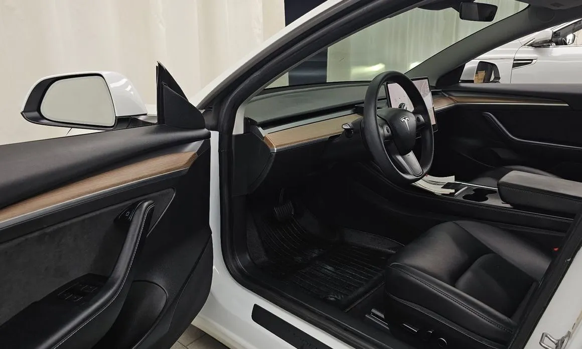 Tesla Model 3 — фото 4