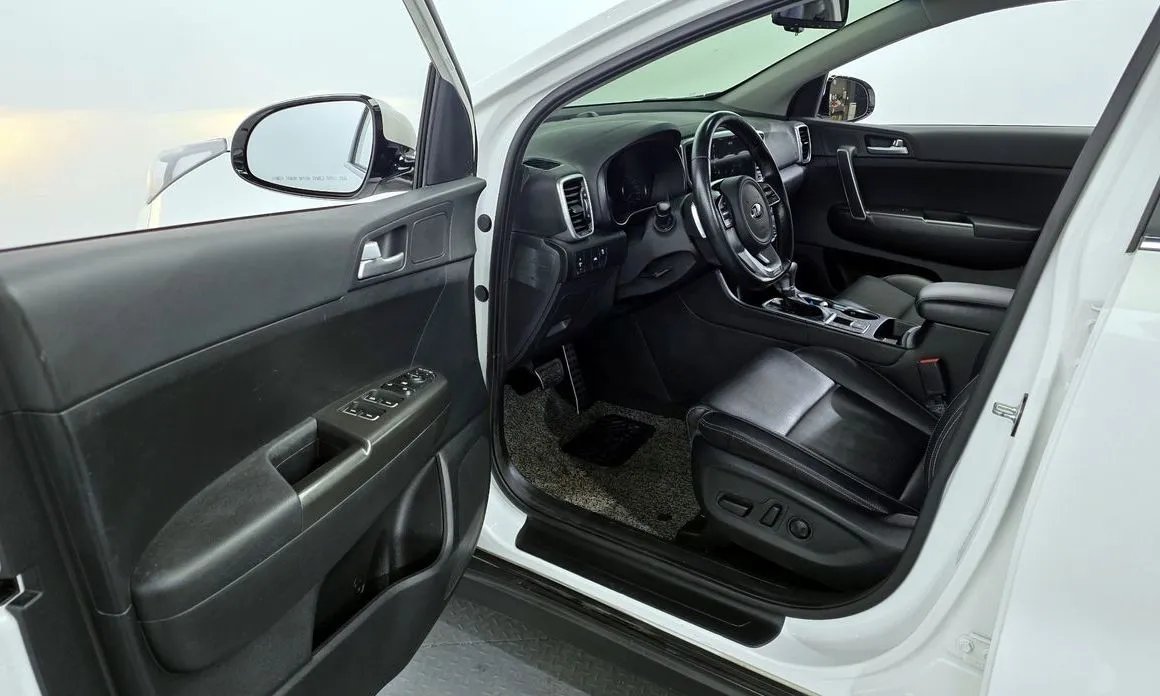 Kia Sportage — фото 8