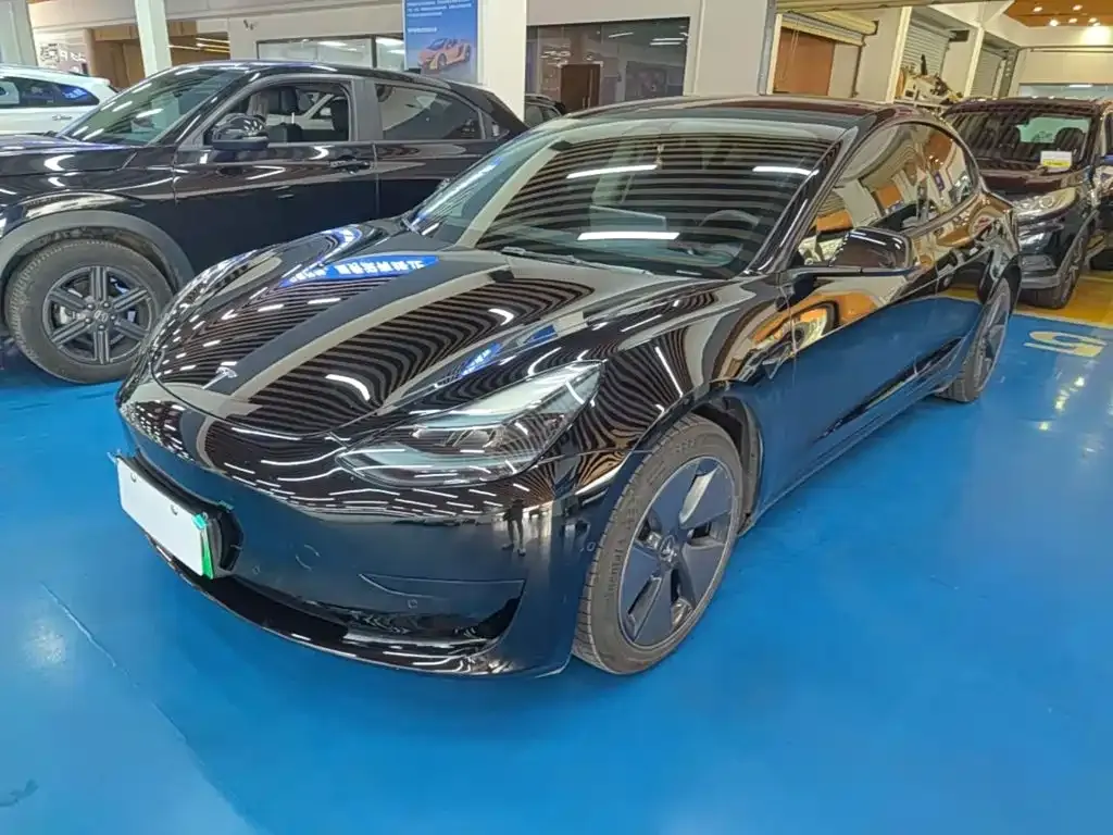 Tesla Model 3 — фото 7