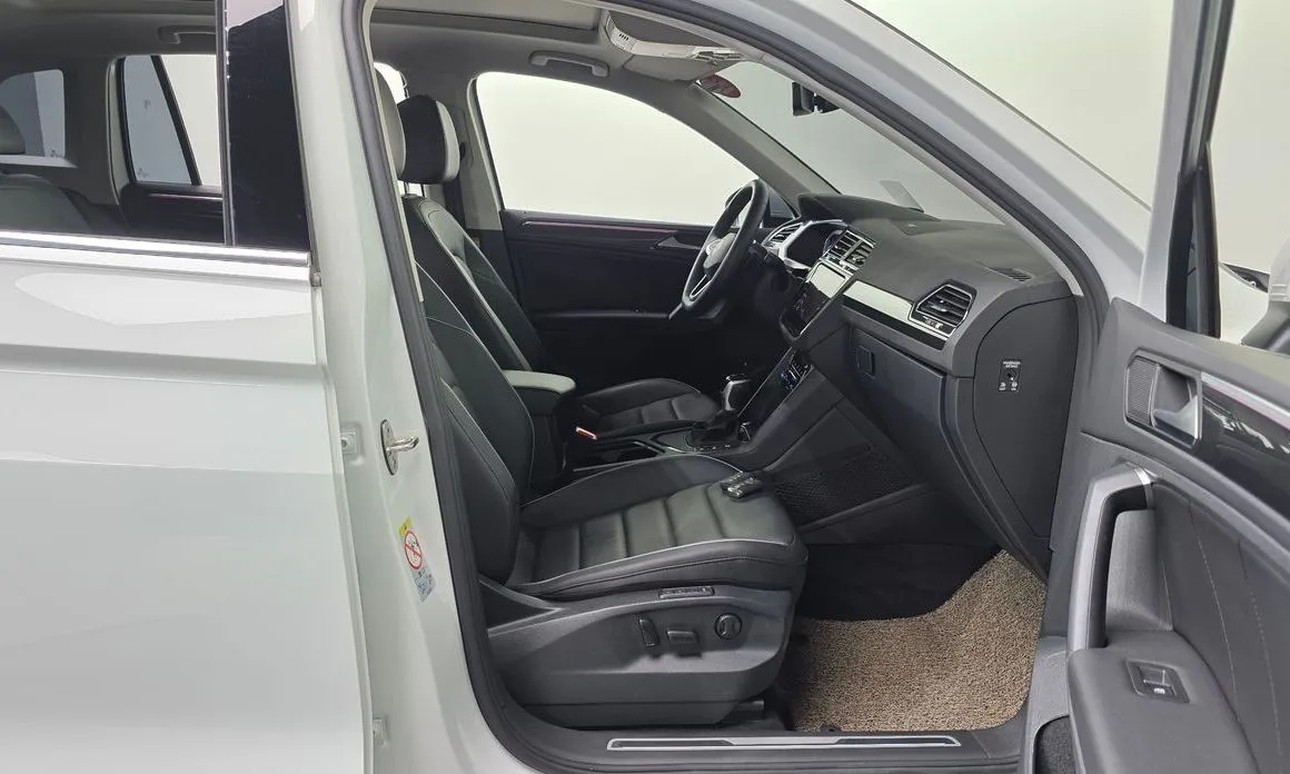 Volkswagen Tiguan — фото 7