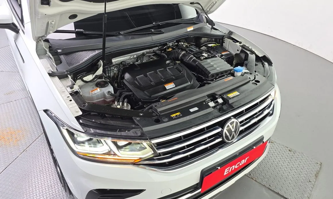 Volkswagen Tiguan — фото 10