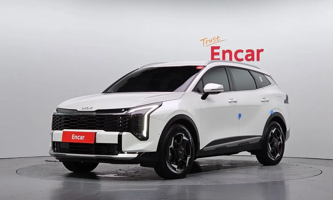 Kia Sportage — фото 1