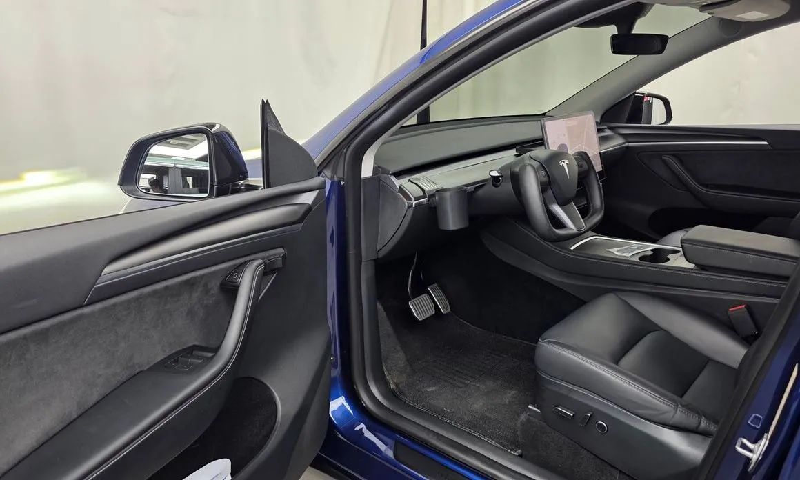 Tesla Model Y — фото 8
