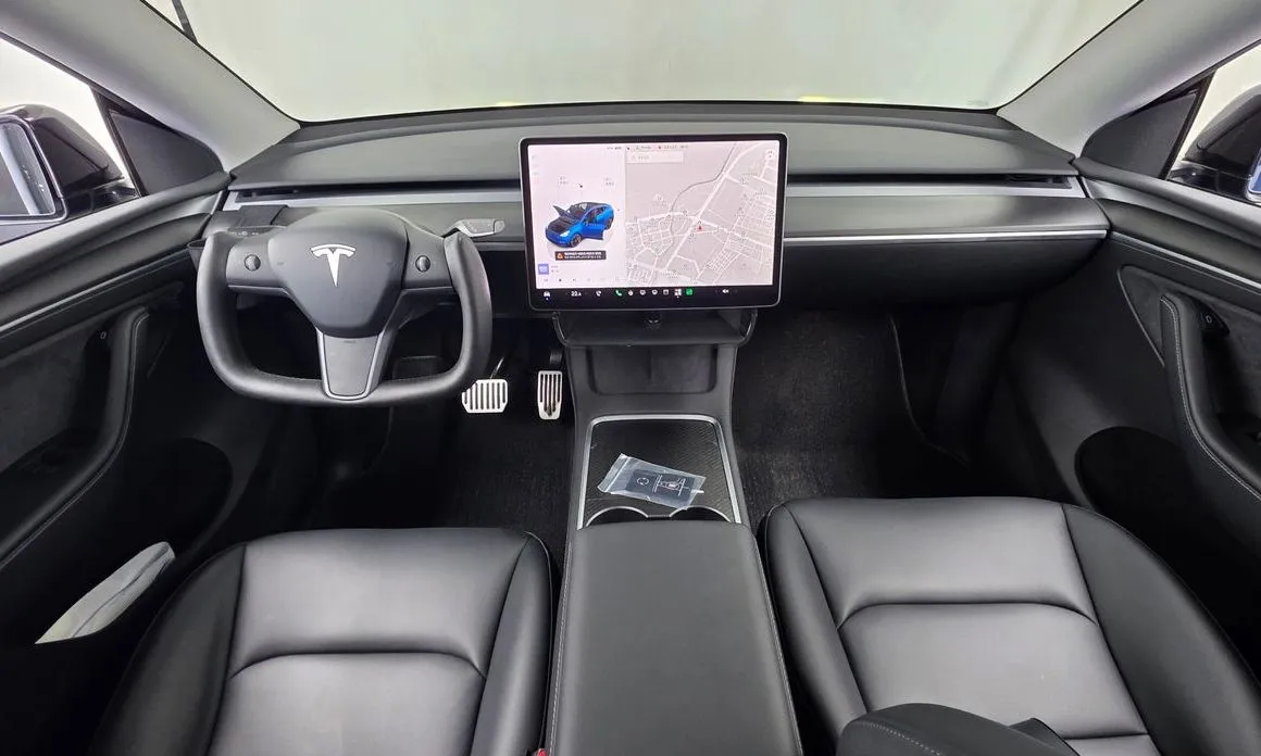 Tesla Model Y — фото 7