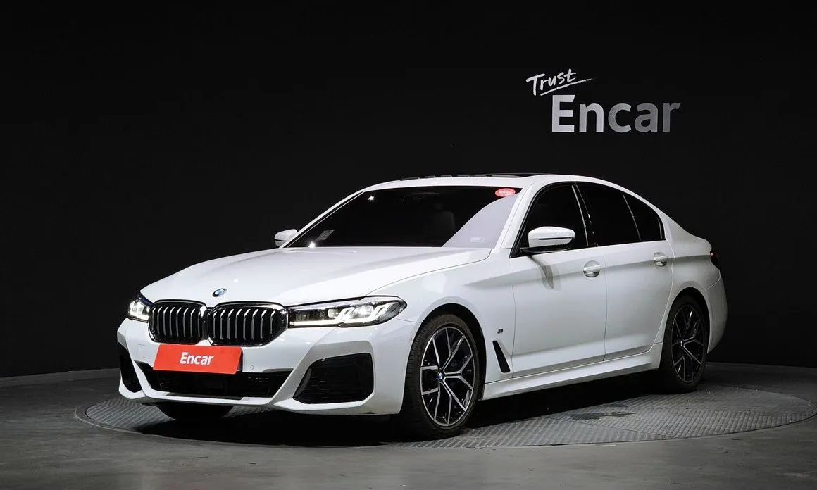 BMW 5-Series — фото 1