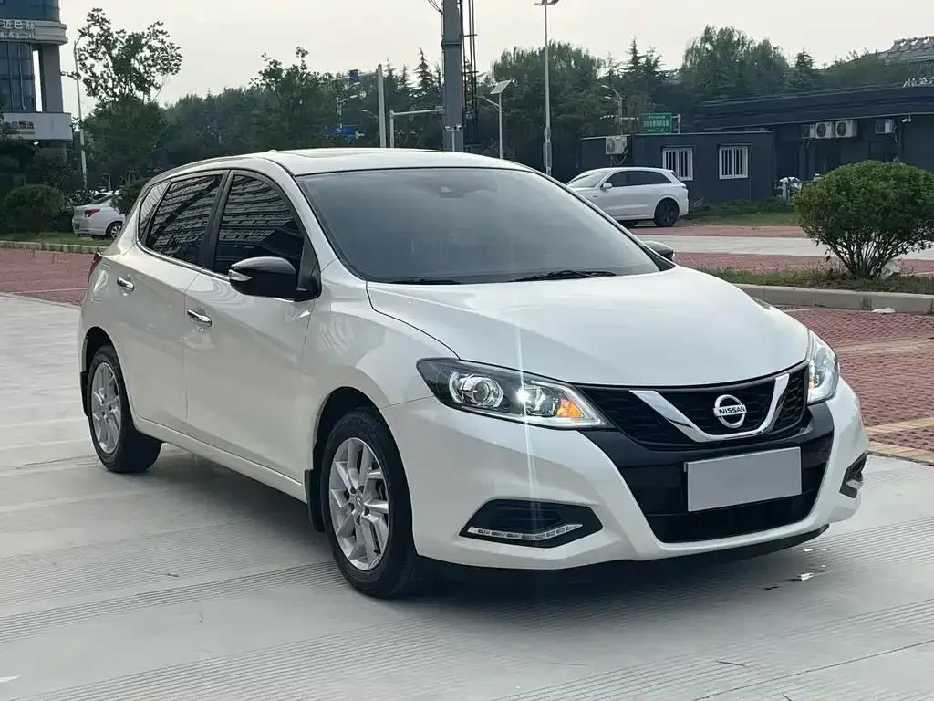 Nissan Tiida — фото 6