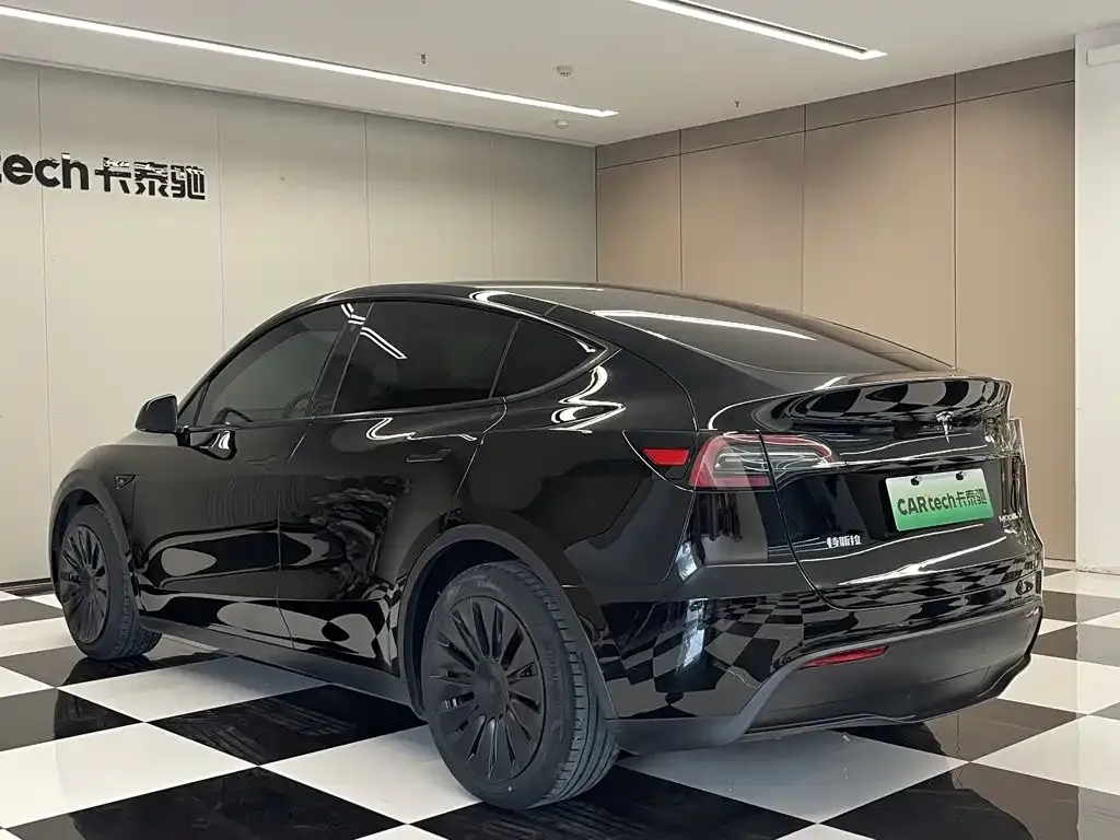 Tesla Model Y — фото 7