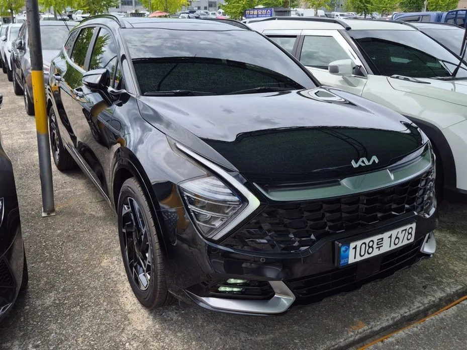 Kia Sportage — фото 1
