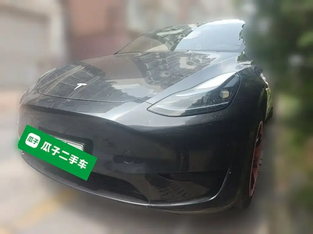 Tesla Model Y — фото 1
